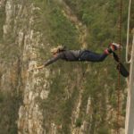 Linda Webb jumping off a bridge