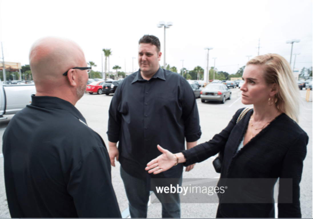 car buying stock photo handshake waiting