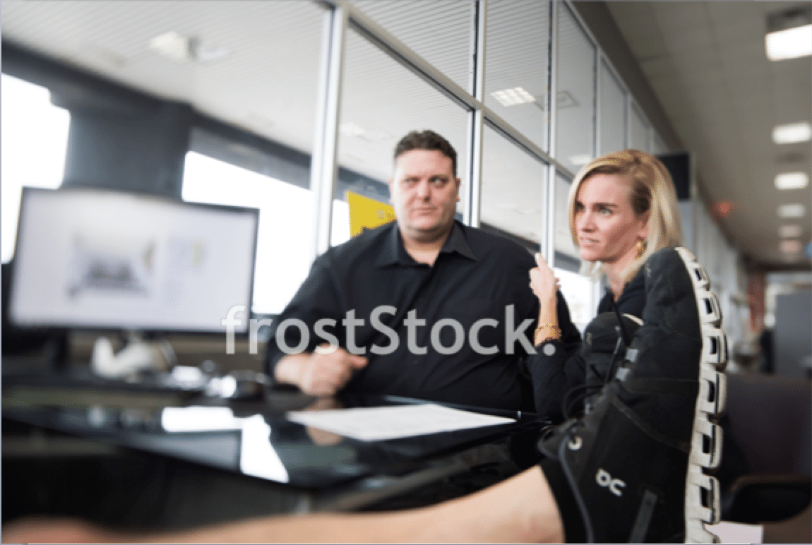 car salesman selling a car stock photo